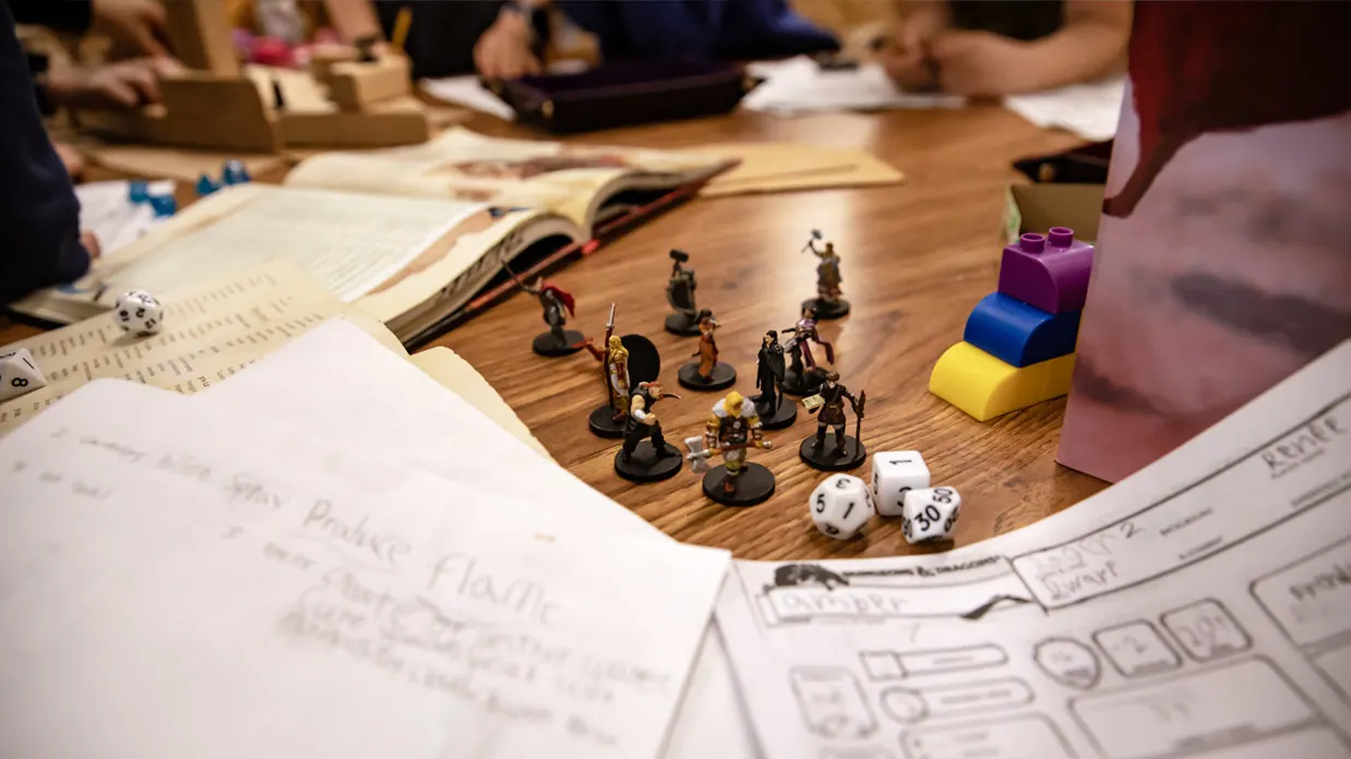 Kids playing tabletop role-playing games at Trackers