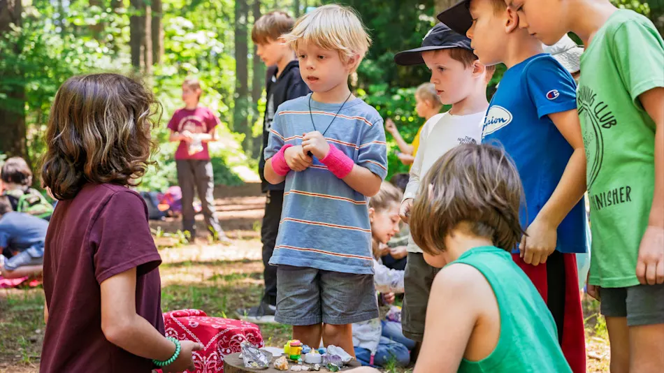 Kids lined up with their trade goods at the Goblin Market