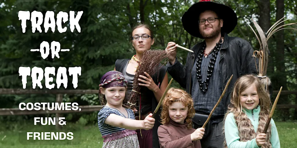 Track-or-Treat: costumed Trackers Guides and kids with bows